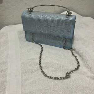 Light blue purse. Very light and elegant